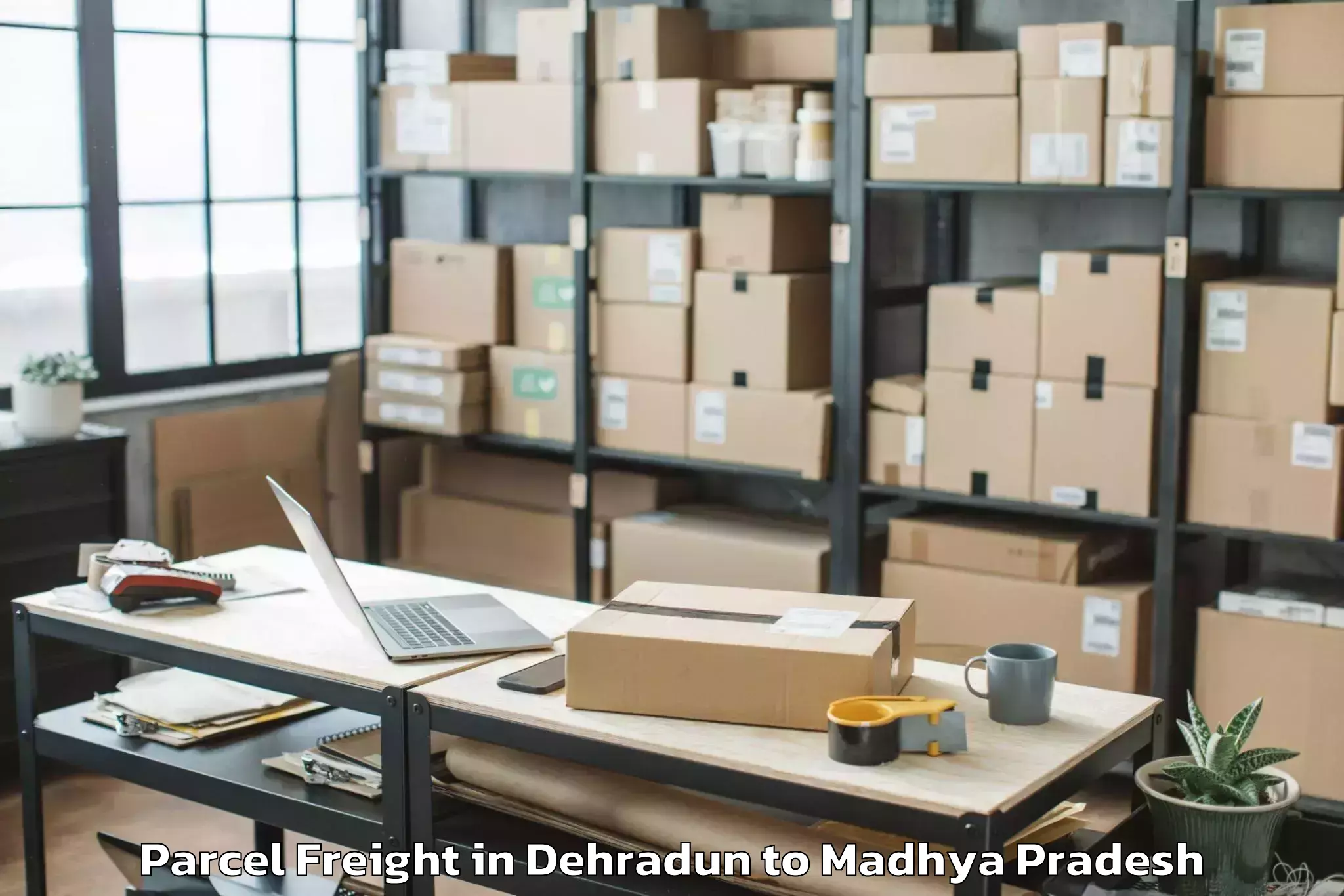 Book Your Dehradun to Bhanpura Parcel Freight Today